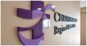 Purple dimensional wall sign